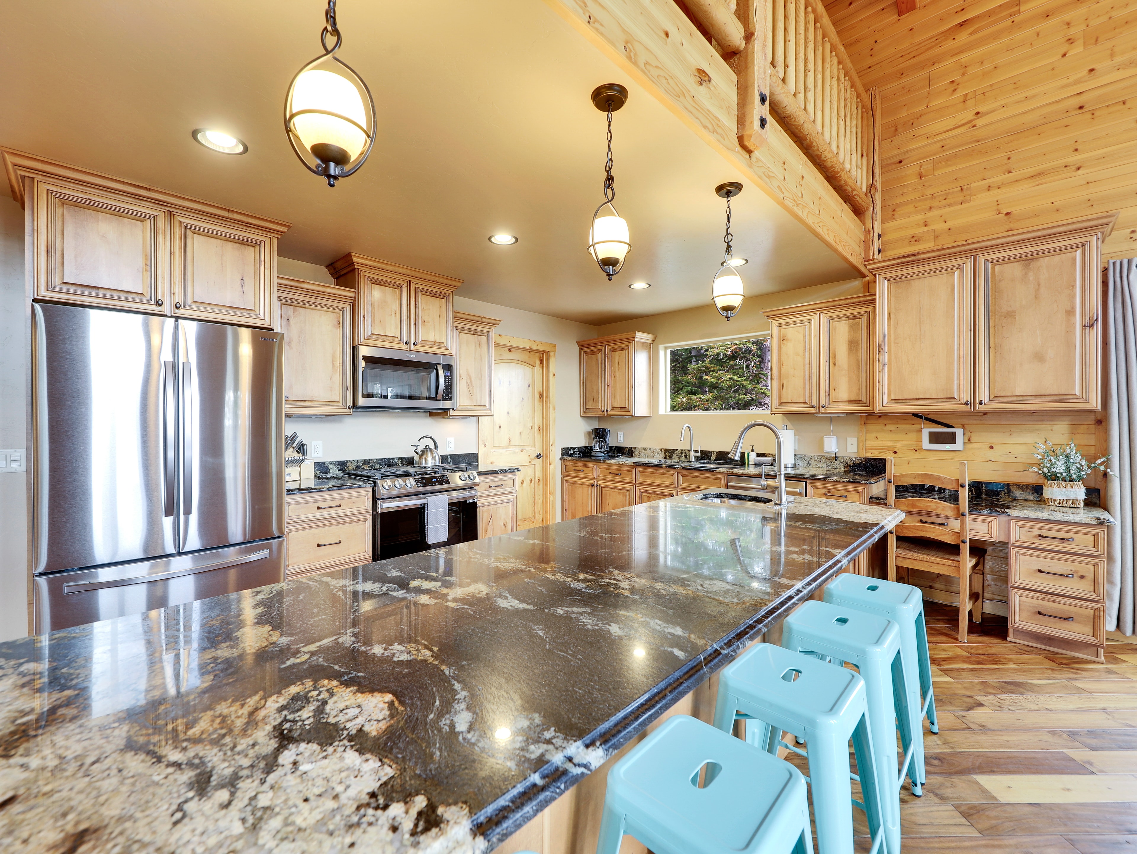 Spacious kitchen with granite island